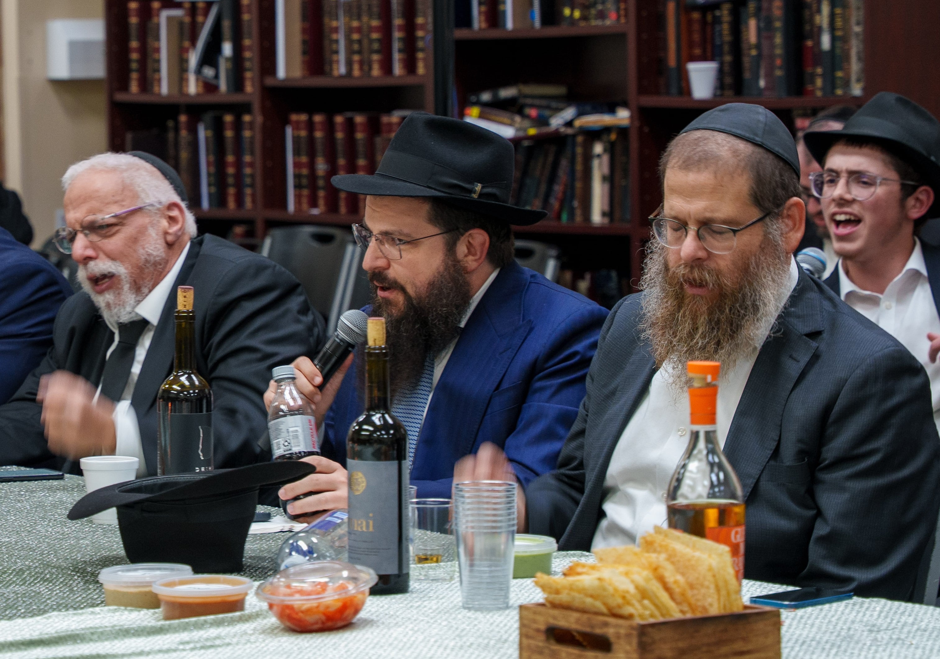 Rabbi Moshe B. Perlstein and Rabbi Eliyahu Nosson Silberberg leading the farbrengen